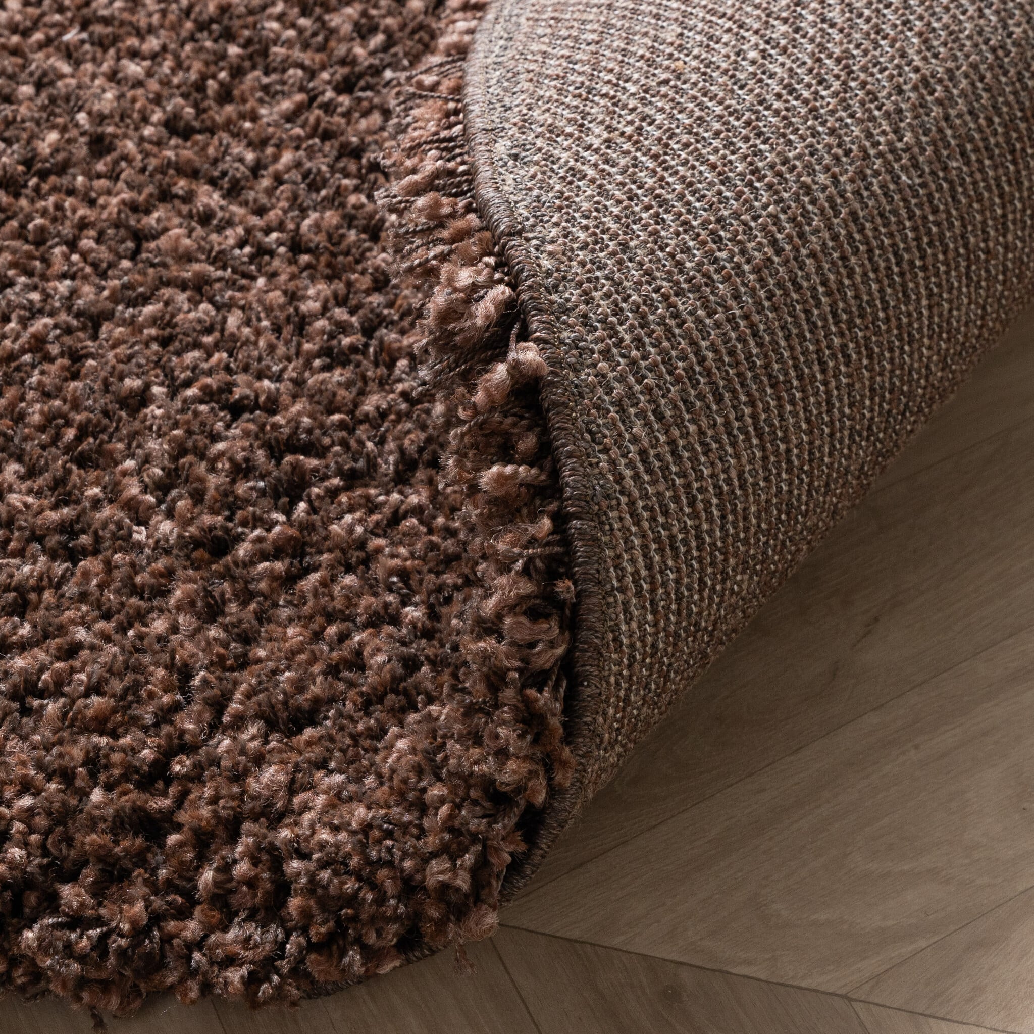 Round shaggy rug - Yves Brown